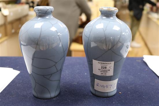 A pair of blue Chinese crackleware vases on stands